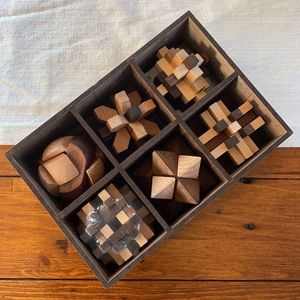 Box of wooden brain games